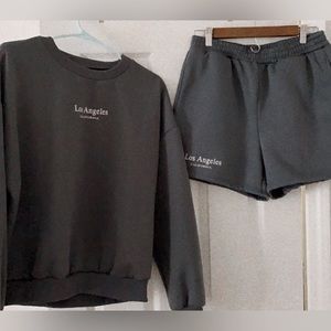 Matching lounge set, darker blue/ navy color.